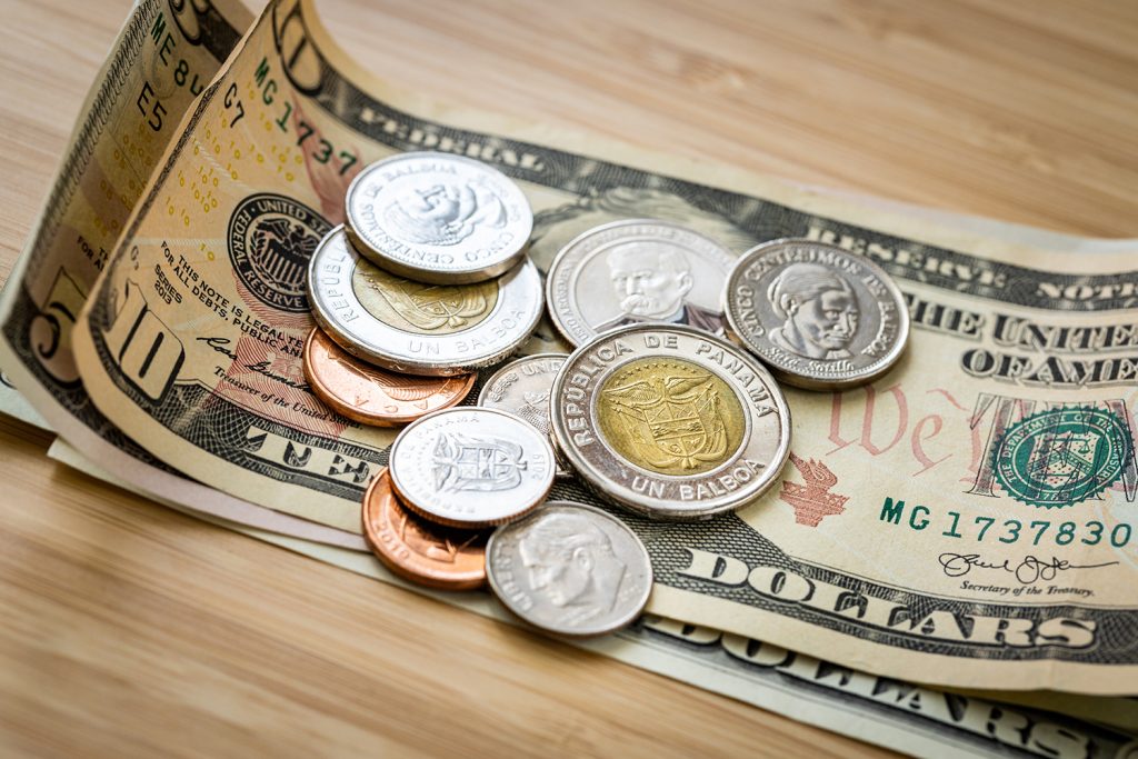 Panama,Balboa,,Money,Coins,And,Us,Dollars.,Financial,And,Business